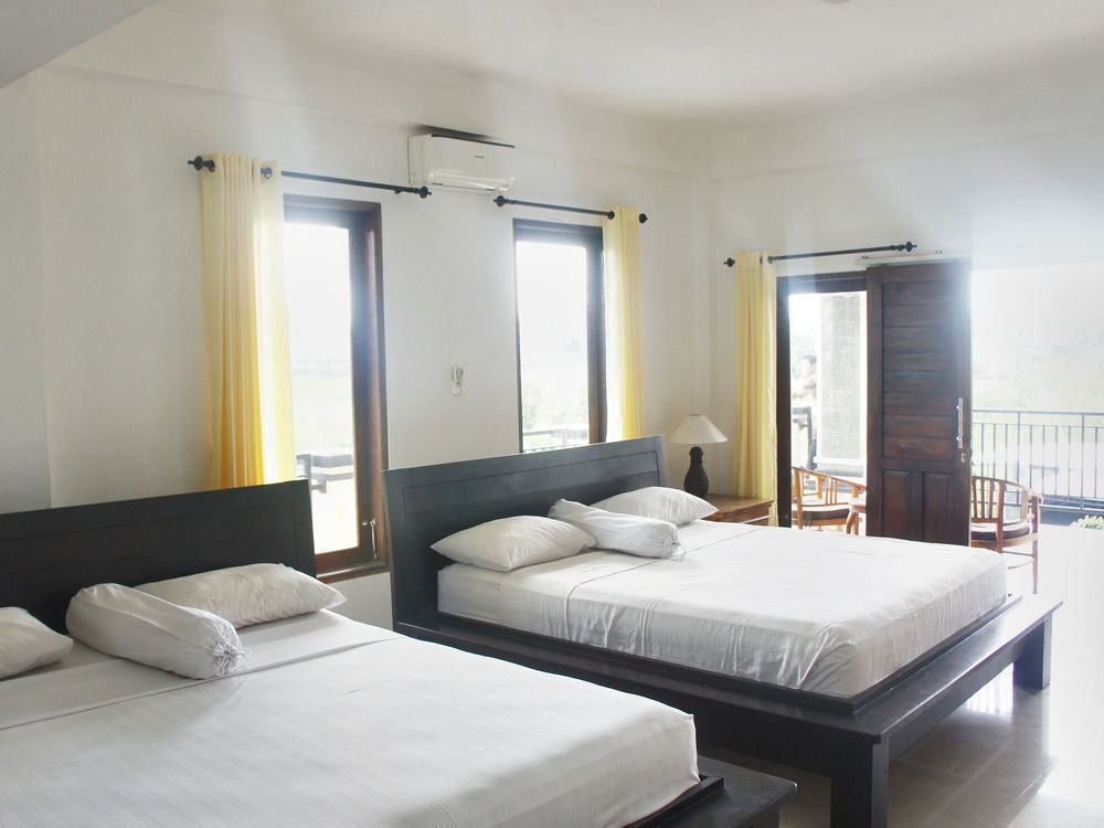 Putu Guest House Canggu Esterno foto